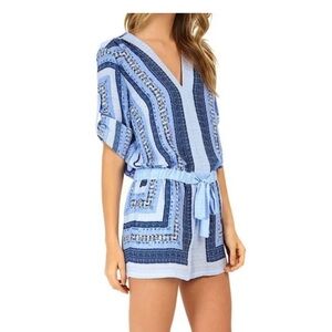 BCBGMaxAzria Blue Jumpsuit with Tie Belt and V-Neckline